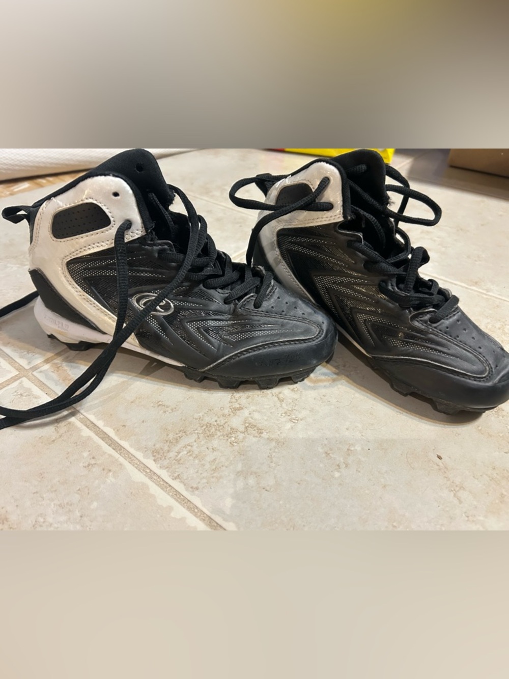 Black and White Youth Cleats Rawlings